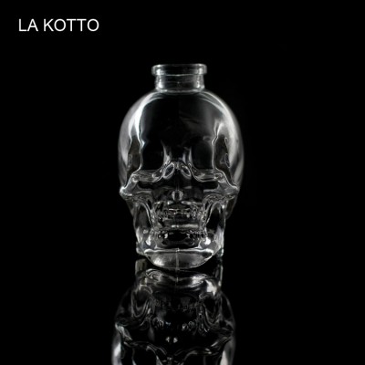 100ml small Skull shape of the glass bottle